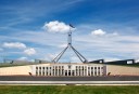 A photo of Australia's Parliament House in Canberra, taken on a bright sunny day