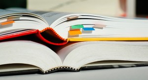 Image of two open textbooks on a desk