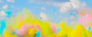 International Conference - Conference - Pink, yellow and blue dust being thrown into th...