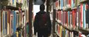 Silhouette of a student in a library